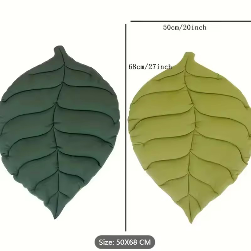 Tapis Chien vert deux teintes  forme de feuille sur fond blanc indicant mesures cinquante par soixante-huit centimètres 